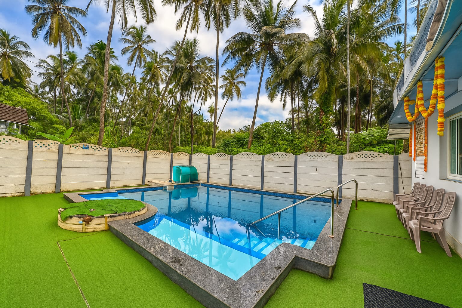 Vandana villa Alibag home 5 Vandana Villa pool and lawn at night