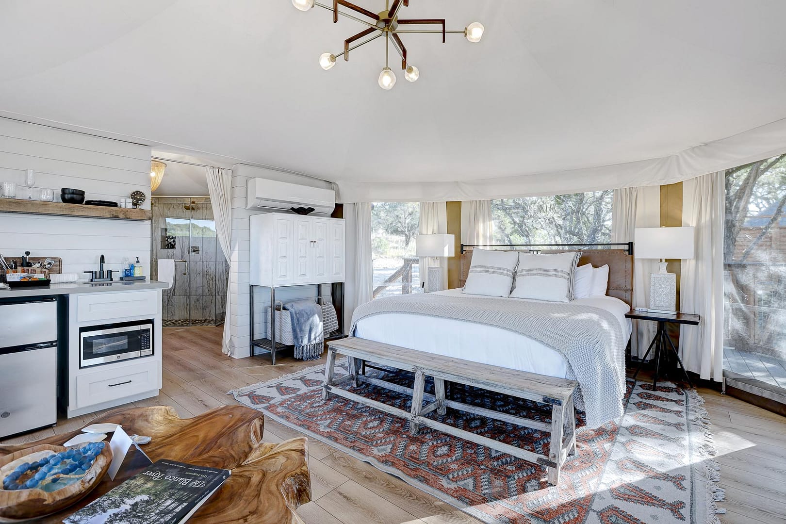 Luxury glamping bedroom in vacation rental glamping tent - Spoon Mountain Glamping Campground - Wimberley, Texas